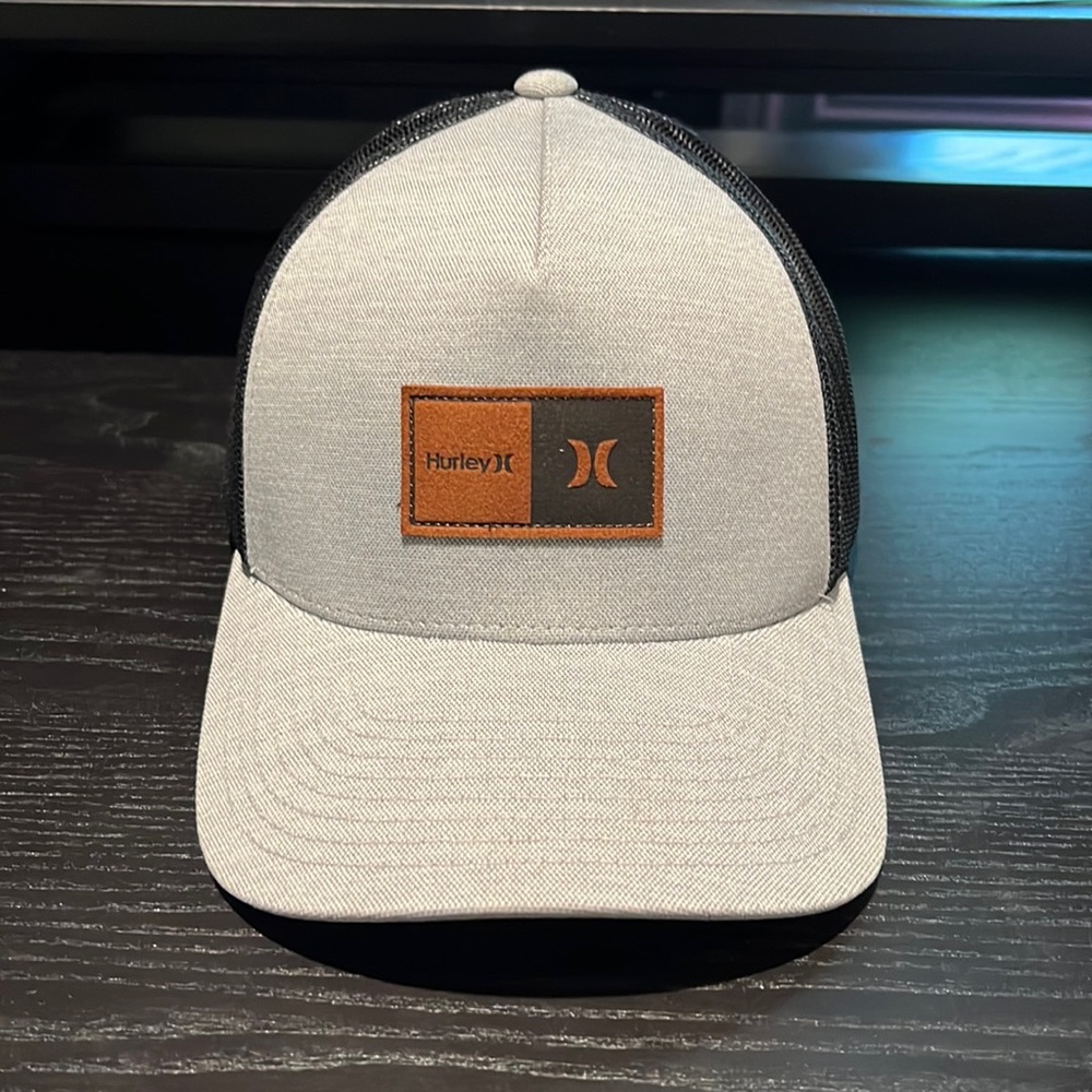 OS snap back Hurley trucker hat